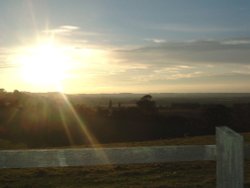View from Houghton house, Berkshire, looking over fields and brickworks factory
