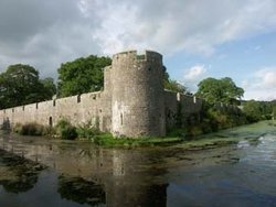 Reflection of the Bishop's Palace in the moat. Wells, Somerset Wallpaper