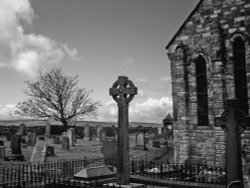 Graveyard and church on Holy Island, Northumberland Wallpaper