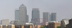 The Tower of Canary Wharf and its Six Grey Dwarfs