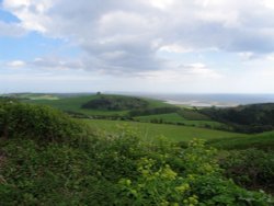 St. Catherine's chapel high on the hill above Abbotsbury and overlooking Chesil beach Wallpaper
