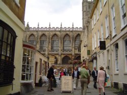 Walking street in Bath with Bath Abbey in background Wallpaper