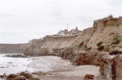 Happisburgh (pronounced Hazeborough), Norfolk, heavily eroded coastline, complete with debris Wallpaper
