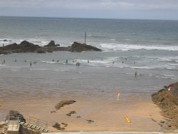 Surfers on Summerleaze Beach, Bude Wallpaper