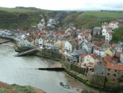 Staithes, North Yorkshire. Looking down accross the harbour from the Cowbar.