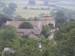View of the church in Clun from Clun Castle in South Shropshire Wallpaper