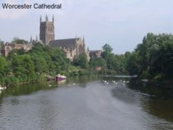 Worcester Cathedral and the river Severn as seen from the main road bridge in Worcester, England.