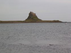 Lindisfarne Castle from the harbour beach. Wallpaper