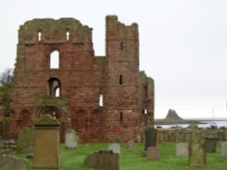 Lindisfarne Priory and Castle. Wallpaper