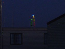 The ferris wheel at Fantasy Island all lit up at the evening. Wallpaper