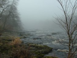 Lower falls at Aysgarth on a damp misty morning Wallpaper