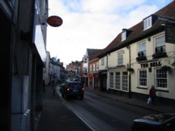 Tring, Hertfordshire. Post Office sign and main street through Tring Wallpaper