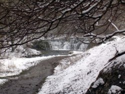 Waterfall in Lathkill Dale, Derbyshire, on a snowy day, March 2006.