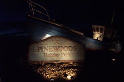 The entrance to Pinewoods caravan and camping park, Wells-next-the-Sea. Wallpaper
