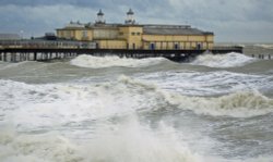 Hastings pier, East Sussex, in a southerly gale. Wallpaper