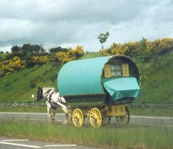 Traveler carvan on A66 near Appleby in Westmoorland, Cumbria. Wallpaper