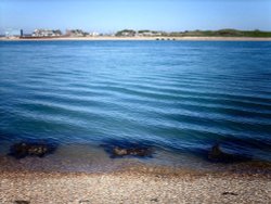 The small strip of sea separating Portsmouth from Hayling Island.

Taken:  5th May 2006 Wallpaper