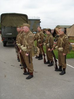 The Home Guard wait for inspection at Yorkshire Air Museum, Elvington, North Yorkshire.