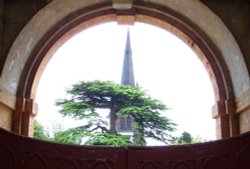 View of the Chapel spire from the former stables, Clumber Country Park, Nottinghamshire Wallpaper