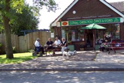 Locals enjoy a coffee at the post office,  New road, Cutnall green Wallpaper