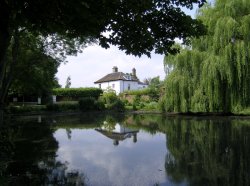 View of the pond of the lovely village of Somerleyton, close to Lowestoft, Suffolk. Wallpaper