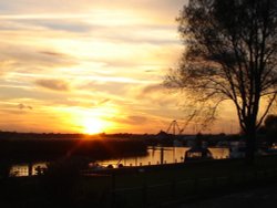 REEDHAM, NORFOLK. SUNSET VIEW IN OCTOBER FROM 