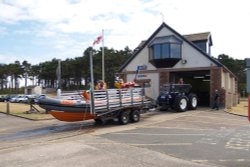 Silloth lifeboat station with lifeboat returning from excercise. Wallpaper