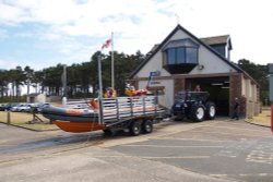 Silloth lifeboat station with lifeboat returning from excercise.