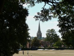 Chichester Cathedral from  the city walls in Priory Park Wallpaper