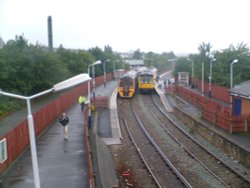 Two passing trains at Accrington staition