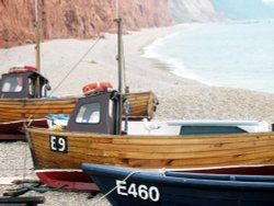 Boats on beach at Sidmouth, Devon. Wallpaper
