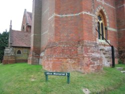 Sign leading to the Alice Memorial at Saint Michael and All Angels Church, Lyndhurst, Hampshire Wallpaper