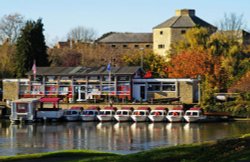 View across the Thames at the Old Gaol and Abingdon Boat Centre, Abingdon, Oxfordshire. Wallpaper
