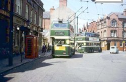 View looking at Trolley buses in Bulwell Market Nottingham (circa 1966) Wallpaper