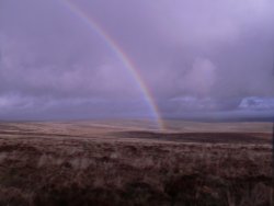 Rainbow over Rue Lake Pits, on Dartmoor, Devon.