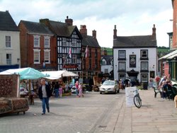 The main street, market day, Ashbourne, Derbyshire. Wallpaper