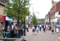 The pedestrianised main street in Buxton, Derbyshire. Wallpaper