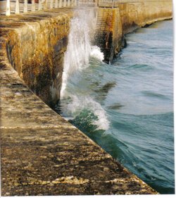 Waves breaking in Newhaven, East Sussex.