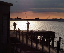 Evening anglers at Landguard Point, Felixstowe. Wallpaper