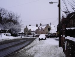Pub in the village of Churchill, Oxfordshire, on a snowy day 2007