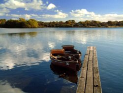 Hornsea Mere reflecting summer clouds Wallpaper