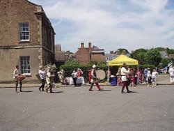 A procession of musicians at the Medieval Fayre in Gloucester in June 2006. Wallpaper