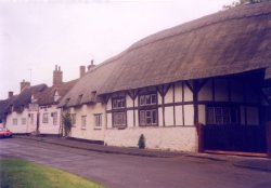 The main street at Long Crendon, Bucks. The pub in the middle distance is now the Eight Bells.