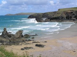 One of many fabulous surfing beaches on the north coast of Cornwall, Porthcovan. Wallpaper