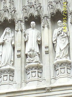 Close-up of frontice statues near Martin Luther King