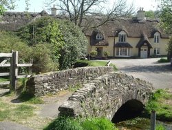 A packhorse bridge in the village of Winsford on Exmoor National Park, Somerset. Wallpaper