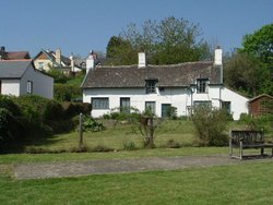 One of the pretty cottages in Winsford on Exmoor National Park in Somerset. Wallpaper
