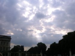 Sunlight breaking trough the clouds at Buckingham Palace. May 24, 2007 Wallpaper
