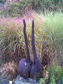 Sculpture in the flower beds at Dillington House, Ilminster, Somerset