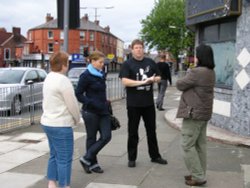 Pattie, Loraine, David (mate & tour guide), and David at the roundabout in Liverpool Wallpaper